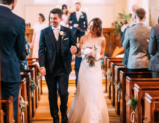 couple walking down the aisle